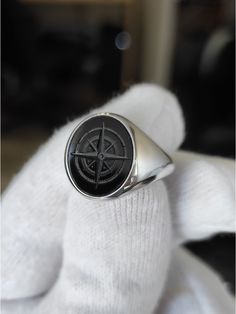 Onyx Compass Signet Ring that can be personalized with your desired Family Crest design. A handmade piece that has been brought to life with the combination of fine goldsmith techniques and the latest technology. 📩 Leave us a message with your custom personalization, your family crest, coat of arms, logo or any design imagined. If you would like a different gemstone instead, please contact us. Gemstone Signet Ring - Compass Ring - Intaglio Ring - Wax Seal Ring - Traveler Ring - Danelian Jewelry Black Sterling Silver Signet Ring With Engraving Option, Black Compass Design Jewelry, Black Etched Rings For Formal Occasions, Formal Black Etched Rings, Classic Black Engraved Ring, Formal Black Engraved Ring With Engraving Option, Black Engraved Ring For Formal Occasions, Black Anniversary Rings With Engraving Option, Black Carved Round Rings