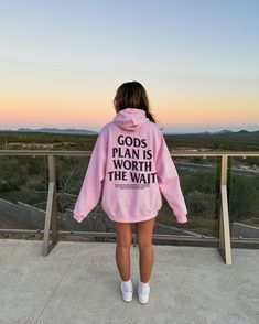 Step into bold faith with our "God's Plan is Worth the Wait Bible Verse" Sweatshirt from Made in Faith Apparel. More than just a garment, it's a declaration of patience, trust, and unwavering belief in the divine plan. 🌟 Product Highlights: Composition: Crafted from a blend of 50% Cotton and 50% Polyester, this sweatshirt combines comfort and durability in one divine package. Features: Enjoy the luxury of pre-shrunk fleece knit for lasting softness, side-seamed construction for a flattering fit, and the convenience of a tear-away label. Fit: The unisex cut with fitted sleeves ensures a stylish and comfortable silhouette for believers of all sizes. Wash & Care: Maintain the integrity of your faith-inspired sweatshirt effortlessly with easy-care instructions - machine wash cold and tumble d God's Plan Is Worth The Wait, Cute Christian Sweatshirts, Cute Hoodies For Teens, Do All Things In Love, Christian Fits, Luxury Hoodie, Bold Faith, Faith Apparel, School Spirit Wear