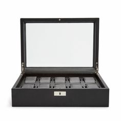 Rule over your collection with authority with a timeless Viceroy 10-piece watch box. A modern classic that exudes an understated elegance, the Viceroy includes a smooth pebble exterior, silver textured silk lining, locking glass cover. SIZE: 12.88" L X 9" W X 3.75" H Mini Arcade Machine, Lux Watches, Mini Arcade, Single Travel, Watch Winders, Watch Stand, Watch Storage, Watch Winder, Glass Cover