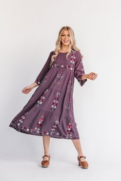 Modest Long Sleeve Dress With Floral Embroidery, Flowy Spring Midi Dress With Floral Embroidery, Modest Embroidered Spring Dresses, Casual Embroidered Floral Dress For Fall, Casual Fall Embroidered Dress With Floral Print, Flowy Embroidered Dress With Floral Details, Flowy Floral Embroidered Dress, Purple Long Sleeve Dress With Floral Embroidery, Fall Floral Embroidered Midi Dress