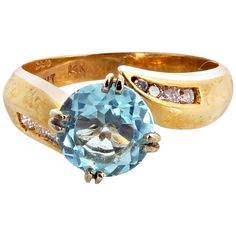 This delightful round gem cut bright blue Aquamarine - 1.68 carats - 8 mm - no eye visible inclusions - enhanced with little sparkling real white Diamonds set in this lovely 14Kt yellow gold ring size 6.5 sizable FOR FREE. This is perfect for daytime into evening events. Gold Statement Ring, White Diamond Ring, Gold Cocktail Ring, Contemporary Ring, Gold Cocktail, Diamond Cocktail Rings, Luxury Rings, Yellow Gold Setting, Aquamarine Blue