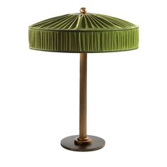 a green lamp with a gold base on a white background, it looks like an umbrella