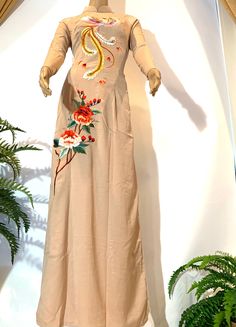 Brand New High Quality Vietnamese Ao Dai. (Free Priority Shipping 1-3 day delivery) Size Chest/BustWaist (in/cm) 3XL 37in/94cm32in/81cm 4XL 39in/99cm35in/89cm 6XL 41in/104cm39in/99cm Please provide Bust, Waist, and Hip measurements when placing your order so we can ensure the best fit for you. To get the best fit, we provide Free Alterations to the Bust and Waist measurements of the Women Ao Dai and the Chest measurement for the men. Please note: Almost all Ao Dai have some sewing Chalk Marks be Dress With Pants, Vietnamese Ao Dai, Gold Wedding Dress, Traditional Wedding Dresses, Long Train, Dress Clothes For Women, Light Brown, Long Dress, Cold Shoulder Dress