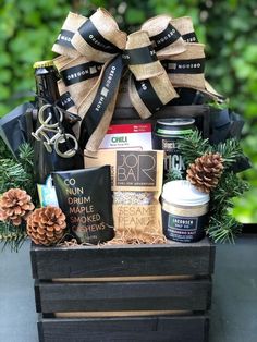 a basket filled with coffee and snacks on top of a table