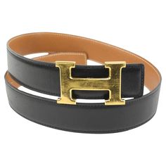 Hermès Black x Brown 32mm H Logo Belt Kit Gold Buckle 3h318s Date Code/Serial Number: Z in a Circle Made In: France Measurements: Length: 33.2" Width: .1" Height: 1.2" OVERALL GOOD CONDITION ( 7/10 or B ) Size 70 Signs of Wear: Length in Inches to First Hole: 26.5" Length in Inches to Last Hole: 28.5" Size: 70 Front Side of Strap: Very Minor Fading, Very Minor Scratches Back Side of Strap: Very Minor Fading, Very Minor Creasing Strap Edges: Very Minor Fading Holes: Very Minor Scuffing Buckle: So H Logo, H Logos, Embroidered Belt, Modernist Jewelry, Kelly Bag, Pearl Leather, Woven Belt, Metal Belt, Western Belts