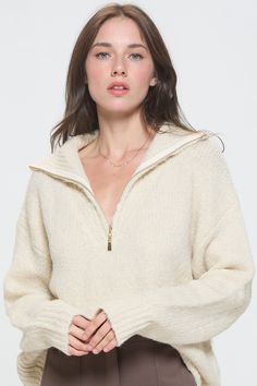 Effortless and essential, this elevated pullover is featured in an oversized, relaxed fit with a half zip front neckline. Cozy up in it's ultra soft knit body with a classic, coastal touch. Product Details Material: 58% Acrylic, 15% Nylon, 27% Polyester. Fit: True to size. Body length: 21" from shoulder to hem (size Small). Fabric: Soft knit. Features: Notch neck polo collar, relaxed body, full sleeves, fitted stretchy wrists. Model: 5'9" / Wearing a size Small. Shipping & Returns Free Shipping Classic Coastal, Half Zip Sweater, Medium Weight Yarn, Half Zip Sweaters, Classic Chic, Full Sleeves, Boyfriend Fit, Zip Sweater, Polo Collar