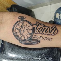 a man's arm with a clock tattoo on it that says namshi and has the date in roman numerals