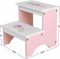 two pink children's step stools with hello kitty on the top and bottom