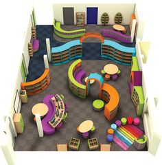 an aerial view of a children's library with colorful seating and bookshelves