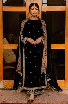 Very elegant velvet 3 piece readymade suit with intricate embroidery.  Suit includes: Shirt- velvet with embroidery  Trouser- velvet with embroidered border  Dupatta- velvet with embroidery Shawl Black, Raw Silk Lehenga, Embroidered Shawl, Velvet Dress Designs, Velvet Shawl, Velvet Bodycon Dress, Velvet Suit, Velvet Trousers, Accessories Style