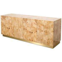 the sideboard is made out of wood and gold