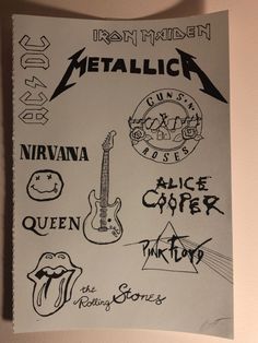 a sheet of paper that has various stickers on it, including an electric guitar