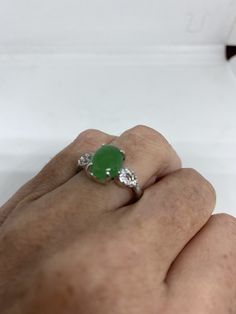 Vintage green nephrite jade Ornate German Silver ring, does not tarnish, NOT sterling Sizes 6.5, 7, 8 or 9 All rings are shipped in a nice gift box. Check out our over a THOUSAND great reviews Engraving is $4 per letter and is not always perfect depending on the piece. It can take a few days if the jeweler is busy. This is payable to Paypal Judithsltd@gmail.com Claddaugh Ring, Lucky Green, Nephrite Jade, Jade Ring, Eye Ring, German Silver, Garnet Rings, Vintage Rings, Silver Fashion