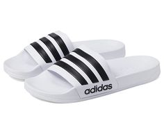 adidas Adilette Shower - Shoes : White/Black/White : Get yourself the trendy adidas Adilette Shower slippers. Synthetic upper, lining and insole. adidas logo on toe strap. Slip-on closure. Synthetic outsole. Imported. Measurements: Weight: 4 oz Product measurements were taken using size Men's 10, Women's 11, width Medium. Please note that measurements may vary by size. Adidas Sporty Slides For Training, Adidas Synthetic Slides For Swimming, Adidas Non-slip Beach Slides, Adidas Slides For Swimming In Summer, Adidas Slides For Summer Swimming, Adidas Non-slip Sport Sandals For Beach, Adidas Slides For Swimming, Adidas Sporty Synthetic Flip Flops, Adidas Slides For Sports