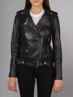 Introducing the ALmi Women Cool Leather Fall Short Motorcycle Jacket, a sleek and stylish outerwear option that combines edgy moto-inspired design with luxurious leather craftsmanship. This jacket is the perfect choice for those looking to add a touch of rebellion to their wardrobe while staying on-trend and fashionable. Crafted from high-quality leather, this motorcycle jacket boasts a supple and buttery texture that feels as luxurious as it looks. The rich black hue adds a timeless appeal, making it a versatile piece that can be effortlessly styled with a variety of outfits. The ALmi Women Cool Leather Fall Short Motorcycle Jacket features classic moto details, including an asymmetrical zip closure, zippered cuffs, and snap button lapels. These elements not only enhance the jacket's aest Fitted Moto Leather Jacket With Asymmetrical Zip, Sleek Black Biker Jacket With Asymmetrical Zip, Edgy Leather Biker Jacket With Asymmetrical Zip, Edgy Leather Jacket With Asymmetrical Zip For Biker Events, Edgy Asymmetrical Zip Leather Jacket For Biker Events, Fitted Biker Jacket With Asymmetrical Zip, Edgy Leather Biker Jacket With Long Sleeves, Edgy Leather Biker Jacket, Chic Leather Outerwear For Biker Events