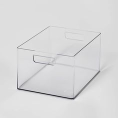 a clear plastic storage box on a white background