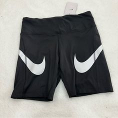 Nike Fast Shorts Black With White Swoosh Tight Fit Has A Zippered Back Pocket See Photos For Approximate Measurements Ynf 13507 Black Biker Shorts With Letter Print, Nike Black Bottoms With Letter Print, Nike Black Sporty Biker Shorts, Black Short Activewear With Letter Print, Black Letter Print Workout Bottoms, Trendy Fitted Black Athletic Shorts, Nike Fitted Black Biker Shorts, Trendy Stretch Nike Bottoms, Nike Shorts Women