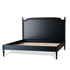 a black bed frame with wooden slats