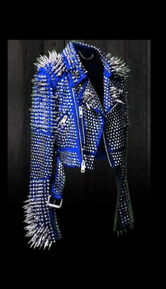 Silver Long Spikes Gothic, Punk Jacket Men Style, Steampunk Studded Clothing, Blue Rock Star Jacket, Handmade Belted Club Wear, Pin Badges with High-Quality Studs. Each securely added by hand Cropped, Vintage-inspired / Moto / Fit Patches Jacket Steampunk Gothic 0.9 to 1.0 MM Cowhide Leather used Jacket has All sizes Available We Offer Customized Size, design, or Changes In Color Make sure to Look at the size chart below before selecting your size. If the Customer Wish we can write their name or Blue Punk Outfits Men, Fitted Winter Outerwear With Spikes, Fitted Long Sleeve Outerwear With Spikes, Alternative Winter Outerwear With Spikes, Rock Style Studded Fitted Outerwear, Edgy Spiked Outerwear For Winter, Punk Biker Jacket For Winter Party, Punk Winter Biker Jacket For Party, Punk Style Biker Jacket For Winter Party