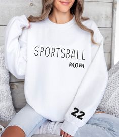 Show support for your favorite school athlete with this cozy sweatshirt. Available in a variety of popular school colors and can be personalized with your athlete's sport/activity and jersey number on the left sleeve.  Ideal for any situation, a unisex heavy blend crewneck sweatshirt is pure comfort. These garments are made from polyester and cotton. This combination helps designs come out looking fresh and beautiful. The collar is ribbed knit, so it retains its shape even after washing. There a Nana Grandma, School Colors, Sports Activities, Cozy Sweatshirts, Cut And Style, Unisex Sweatshirt, San Jose, Crewneck Sweatshirt, Sweat Shirt