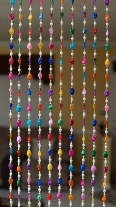 multicolored beads hanging from the ceiling