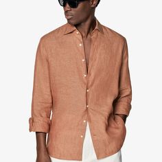 Tailored to a slim semi fit with a hint of tapering at the waist, this casual orange shirt features heat-sealed buttons and soft cuff and collar interlining. Formal Brown Shirt For Spring, Casual Orange Shirt For Workwear, Casual Orange Shirt With Spread Collar, Casual Orange Shirt For Work, Formal Brown Spring Shirt, Classic Orange Tops For Fall, Orange Tops With Spread Collar For Spring, Classic Orange Tops For Spring, Classic Orange Top For Fall