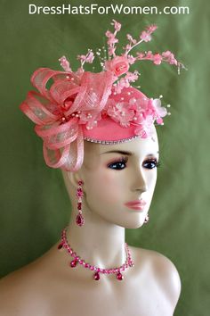 Women’s Pink Coral Sinamay Straw Flower Large Sinamay Bow Fashion Designer Haute Couture Hat Headpiece Wedding Fascinator Hair Accessory. A Large Pink Sinamay Straw Bow Is Placed On A Simulated Pink Sinamay Straw Round Base, Accented With Custom Dyed Silk Flowers. A Row Of Acrylic Rhinestone Encircles The Base Of This Beautiful Headpiece. This Formal Art Deco Styled 1920’s Style Flapper Hat Wedding Headpiece Can Be Worn In Different Positions. This ladies bespoke couture formal designer wedding fascinator hat is appropriate to wear for horse races, The Kentucky Derby, The Dubai World Cup, The Royal Ascot, The Melbourne Cup, Belmont Stakes, The Preakness Stakes horse racing, Church, weddings, and special occasion. This lovely Spring and Summer fascinator is also suited for mother of the bri Special Occasion Hats, Fascinator Hair, Preakness Stakes, Custom Made Hats, Bow Fashion, Bridal Fascinator, Flapper Hat, Couture Hats, Hat Wedding