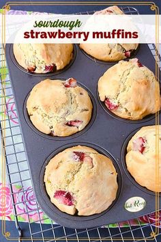 a muffin tin filled with freshly baked strawberry muffins