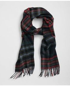 Crafted in Scotland, our classic fringe scarf is cast from luxe cashmere yarns for an elevated approach to your outerwear style. In a chic plaid motif, it looks just as handsome with a camel hair polo coat as it does with a bomber jacket.11 ¾ X 67 ½ with 2 ¾ fringe 100% CashmereDry CleanMade in United Kingdom | Men's Cashmere Plaid Fringe Scarf Polo Coat, Mens Cashmere, Cashmere Yarn, Fringe Scarf, Plaid Scarf, Scotland, Camel, United Kingdom, Checks