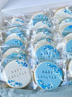 baby shower cookies in a box with blue sprinkles