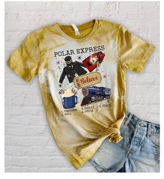 a t - shirt that says polar express on the front, and an image of a man