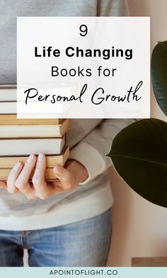 a woman holding books with the title 9 life changing books for personal growth