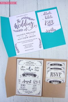 the wedding stationery is set up on top of a card and some envelopes