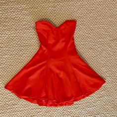 Material Is Thick And Stretchy, Almost Like Neoprene. Never Worn, But Altered To Fit Like A S, Stitches In Back Can Be Taken Out To Fit M. Rubber Around Bust Area Keeps Dress In Place. Red A-line Mini Dress With Lining, Red A-line Mini Dress Lined, Flirty Red Lined Mini Dress, Holiday Fitted Strapless Dress, Holiday Strapless Fitted Dress, Strapless Fitted Holiday Dress, Red Mini Dress With Sweetheart Neckline, Red Lined Dress For Holidays, Yellow Flower Dress