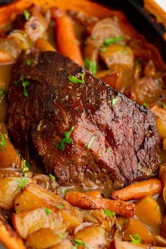 a pot roast with carrots, potatoes and parsley on the side is ready to be eaten