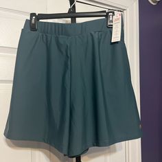 From Honey Mark, This Is A Women’s Pair Of Size Large Swim Shorts. Fully Lined New With The Tags. I Could Not Find A Stock Picture Of The Shorts In The Teal Color So I Included A Stock Picture Of Them In Black. The Short You Will Receive Are The Teal Green Color. Can Be Worn As Part Of A Swimsuit Or Just Any Every Day Short. Super Quick Drying Material. I Have Separate Tops Listed To Complete The Outfit. Please Take A Look At My Other Listings As I Have Over 50 Different Pieces Of Honey Marc Lis Blue Swimwear With Built-in Shorts For Beach, Blue Swimwear With Built-in Shorts For Swimming, Green Stretch Swimwear With Built-in Shorts, Swimming Bottoms With Built-in Shorts In Green, Solid Moisture-wicking Swimwear Shorts, Teal Green Color, Swim Shorts Women, Shorts Athletic, Teal Colors