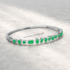 Shine with elegance! This 3.25 Carat Lab Grown Emerald Minimalist Cuff Bangle Bracelet is a stunning May birthstone gift for her. Handcrafted with love, this custom-made jewelry piece features a vibrant emerald gemstone, perfect for birthdays, anniversaries, or just because. Order now and make it a personalized treasure! 𝐅𝐞𝐚𝐭𝐮𝐫𝐞𝐬:• 𝐌𝐚𝐝𝐞 𝐭𝐨 𝐎𝐫𝐝𝐞𝐫• 𝐌𝐞𝐭𝐚𝐥: 𝟏𝟎𝐊 𝐆𝐨𝐥𝐝 | 𝟏𝟒𝐊 𝐆𝐨𝐥𝐝 | 𝟏𝟖𝐊 𝐆𝐨𝐥𝐝 • 𝐁𝐚𝐧𝐝 𝐂𝐨𝐥𝐨𝐫𝐬: Rose Gold, Yellow Gold & White Gold• 𝐖𝐢𝐝 Elegant Green Cuff Bracelet For Formal Occasions, Classic Gemstone Bangle For Anniversary, Elegant Gemstone Cuff Bracelet For Anniversary, Elegant Oval Cuff Bracelet For Anniversary, Elegant Oval Green Bangle, Elegant Green Oval Bangle, Modern Gemstone Cuff Bracelet For Formal Occasions, Elegant Green Bangle For Anniversary, Modern Gemstone Bracelets For Anniversary