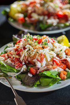 the salad is prepared and ready to be eaten on the table in the restaurant or bar