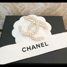 Gorgeous Authentic Chanel Large Cc Gold Pearl Brooch. From The Continuous 2016 Collection By Karl Lagerfeld. Featuring Gold Plated Metal With Adorned With Pearls. Pin Closure. Measurements: Length 1.4", Width 1.9". Excellent Condition. Includes Box. Classic White Brooches For Evening, Classic White Evening Brooches, Chic White Formal Brooch, Luxury White Brooch For Gift, Luxury White Brooches As Gift, Luxury White Brooches For Gifts, Designer White Brooches For Wedding, Designer White Brooches For Formal Occasions, Designer White Wedding Brooches