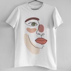 Feminine Line Art Up Close Face Tee Brand New! Our In House T-Shirts Are High Quality And Printed On Demand. This Tee Features Gorgeous Shades Of Cream, Peach, And Mauve Tones, 100% Cotton, Relaxed Boyfriend Fit, And Print Of Abstract Line Art Woman's Half Face. Size S-Xl Available (Model Is Wearing A Size M) Minimal Minimalist Feminist Mid Century Female Faces Blush Natural Boho Bohemian Vintage Retro Aesthetic Unisex Artsy White Crew Neck T-shirt, Artistic White Relaxed Fit Shirt, Artistic White Top With Screen Print, Artsy White Short Sleeve T-shirt, Artistic White Short Sleeve Tops, Artistic White Tops With Short Sleeves, Artsy White Graphic T-shirt, Artistic White Crew Neck Top, Feminine Line Art