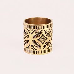 Embrace the rugged charm of the Natalie bandana ring! This stylish piece puts a modern spin on a classic bandana motif, perfect for those with an adventurous spirit. Pair it with our Natalie bandana for a double dose of style. Bandana ring: Slides right up! Also fits on a finger, about size 8 Approximately 1 inch diameter Comes with a small drawstring bag made from bandana remnants A word about brass: When your item arrives, it will be packaged in a poly bag which keeps the shiny finish intact. Bandana Ring, Style Bandana, Small Drawstring Bag, Tree Hugger, Stationery Pens, Poly Bags, Brass Jewelry, Gift Accessories, Baby Bag