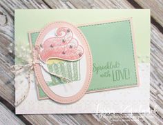 a close up of a card with a cupcake on it