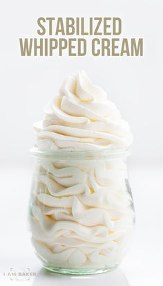 a glass jar filled with whipped cream on top of a white tablecloth next to the words, starbuzzed whipped cream