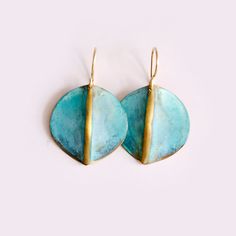 New patina earrings for when you just want a little something colorful and softly edgy. These earrings are a playful take on a Stingray, with just a gestural element, sculpted in metal to give them a rather soft feeling of movement. Truly abstract, but great for the lover of ocean wonders. A llittle something bright and colorful for your ears to catch attention this summer. Bright Color Jewelry, Hand Forged Blue Round Earrings, Unique Brass Earrings For Everyday Wear, Stingray Jewelry, Unique Everyday Brass Earrings, Everyday Artsy Earrings, Hand Forged Artsy Earrings For Gifts, Artsy Hand Forged Earrings For Gift, Artsy Hand Forged Earrings As Gift