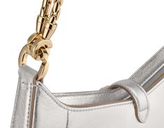 Serpenti Baia Small Shoulder Bag In Silver Striated Calf Leather With Foggy Opal Grey Nappa Leather Lining. Captivating Snakehead Magnetic Closure In Light Gold-plated Brass Embellished With Brushed Grey Enamel And Light Gold-plated Brass Scales And Black Onyx Eyes; Additional Zipped Top Closure. Luxury Gold Bag With Horsebit Detail, Luxury Gold Bags With Horsebit Detail, Elegant Rectangular Shoulder Bag With Horsebit Detail, Elegant Gold Shoulder Bag With Horsebit Detail, Modern Evening Shoulder Bag With Horsebit Detail, Evening Rectangular Shoulder Bag With Horsebit Detail, Gold Shoulder Bag With Palladium Hardware For Evening, Luxury Leather Shoulder Bag With Horsebit Detail, Luxury Silver Shoulder Bag With Gold-tone Hardware