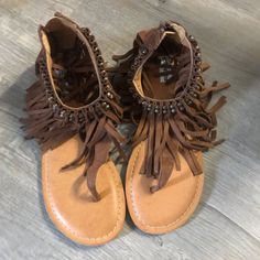 Brand New Brown Fringe Sandals. I Bought Them Last Summer And They Don’t Fit, But It’s Too Late To Return. They Are So Cute!! Size 6, Could Also Fit 5.5. Not Rated Brand With Cute Detailing And Zipper On Back. Offers Welcome! Trendy Brown Sandals For Festival, Festival Brown Flat Heel Sandals, Brown Toe Post Sandals For Festival, Brown Flat Heel Sandals For Festival, Barefoot Sandals Wedding, Brown Fringe, Fringe Sandals, Too Late, On Back