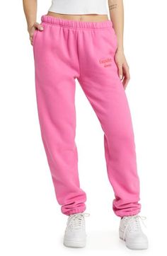 Encourage kindness everywhere you go in these supersoft sweatpants made from cotton-blend fleece. 31" inseam; 10" leg opening; 11" front rise; 15" back rise (size XS) Elastic waist with internal drawcord Front slant pockets 50% cotton, 50% polyester Machine wash, line dry Imported Pink Sweatpants With Ribbed Cuffs For Jogging, Pink Cotton Sweats For Jogging, Casual Pink Fleece Joggers, Pink Athleisure Sweatpants With Ribbed Cuffs, Pink Winter Sweatpants For Jogging, Pink Relaxed Fit Sweatpants For Jogging, Sporty Pink Fleece Bottoms, Fall Pink Sweatpants For Loungewear, Pink Cotton Sweats With Elastic Waistband