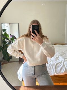 "Vintage solid cream crew neck sweatshirt with some light brown speckles throughout the fabric (very hard to see). She is soft and comfy due to pre-love wear and is in great condition. Inside is super soft. No physical signs of wear.   Tag reads Jerzees - size M (men's) - 100% cotton. Made in USA  Recommended for sizes xs-l depending on desired fit. Model is a size medium. Approximate flat lay measurements are as follows: 21\" shoulder to shoulder - 21.5\" underarm to underarm - 26\"  top of shoulder shoulder to hemline. . There is always a possibility of minor flaws in vintage items due to pre-love wear. We will always mention them in the description above but if you have further questions or would like further images before purchasing, please email us at shopbadtourist@gmail.com and we a Off White Sweatshirt, Cream Sweatshirt, Sweatshirt Oversized, Vintage Pullover, Vintage Pullovers, Sweatshirt Vintage, White Sweatshirt, Flat Lay, Light Brown