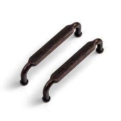 two antique style handles on white background