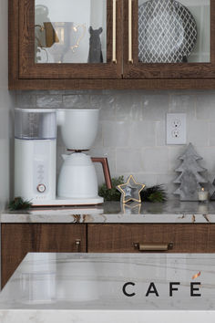 the kitchen counter is clean and ready to be used for christmas dinner or other special occasion